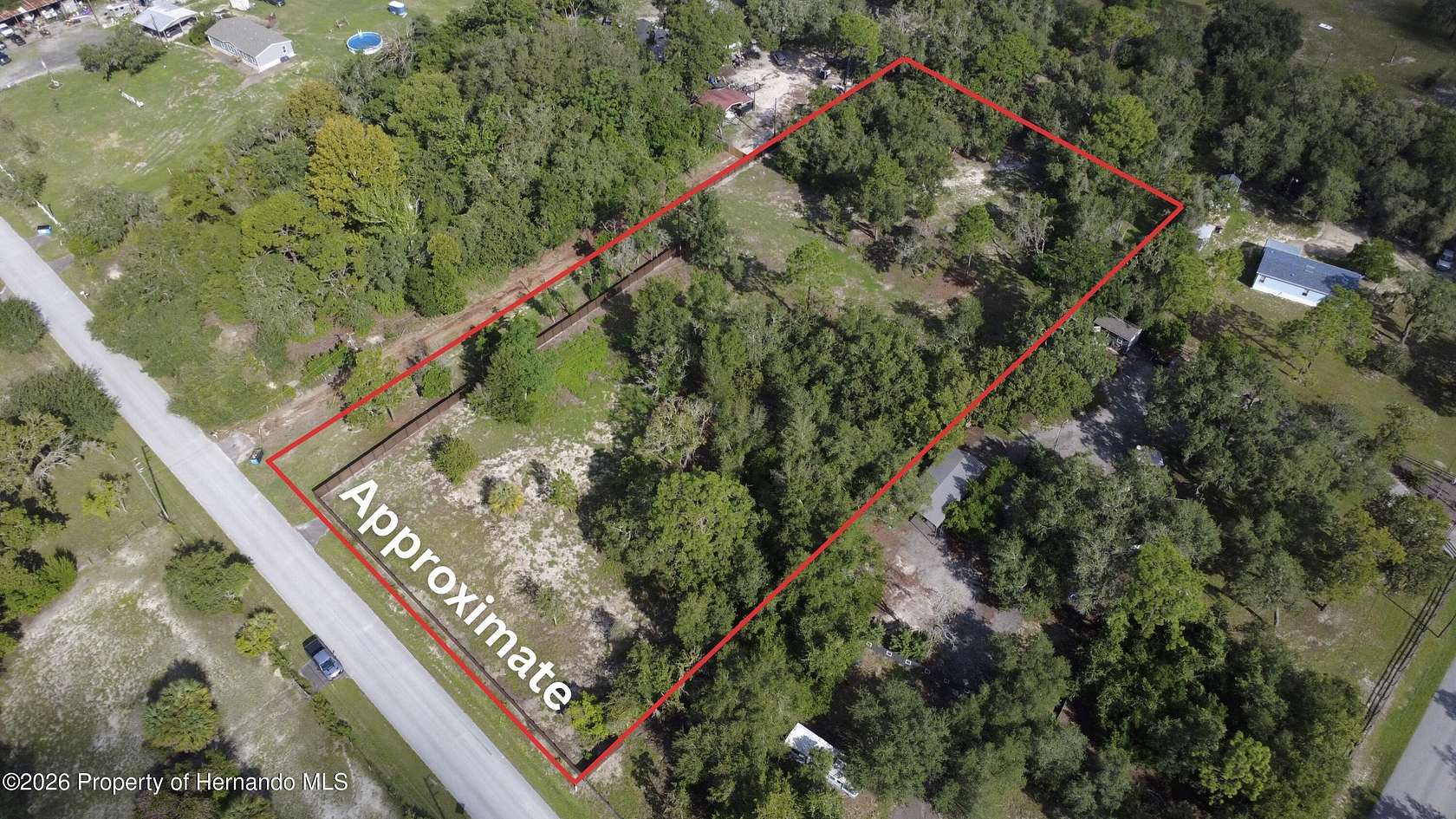 2.88 Acres of Residential Land for Sale in Spring Hill, Florida