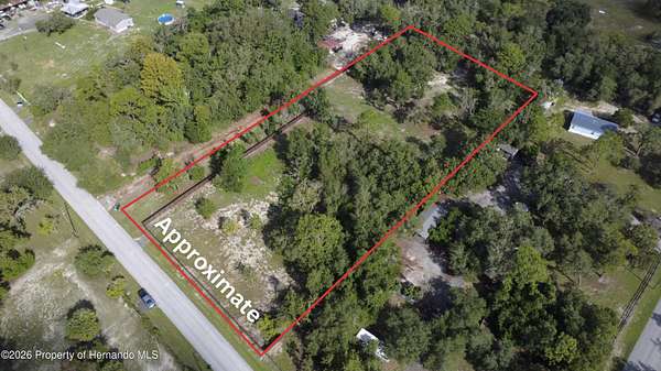 2.88 Acres of Residential Land for Sale in Spring Hill, Florida