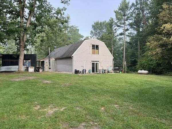 27 Acres of Recreational Land with Home for Sale in Harrison, Michigan