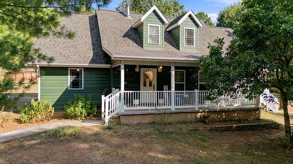 44.2 Acres of Land with Home for Sale in Gainesville, Missouri