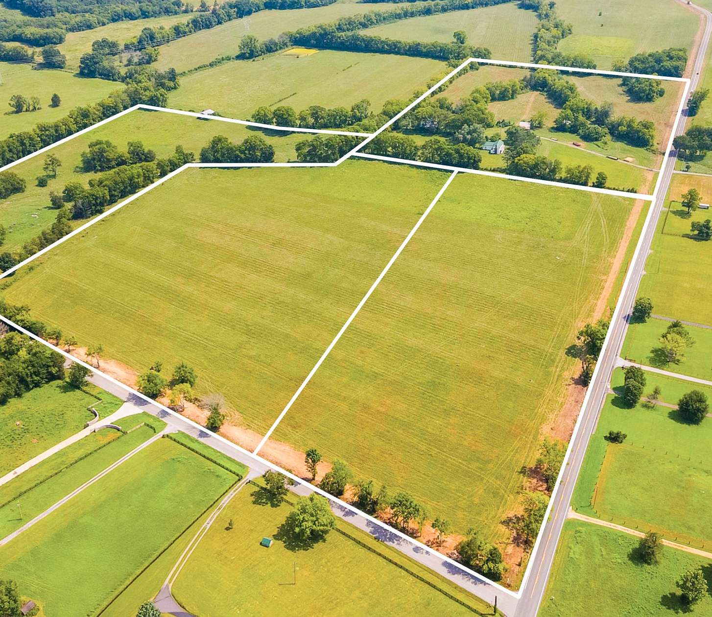 159 Acres of Agricultural Land with Home for Auction in Thompson's Station, Tennessee