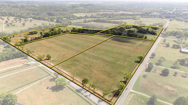 159 Acres of Agricultural Land with Home for Auction in Thompson's Station, Tennessee