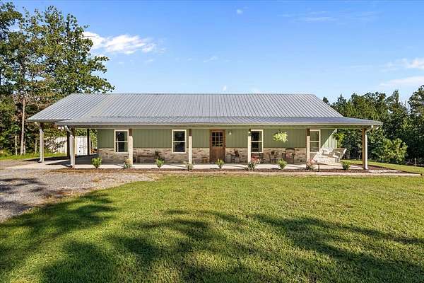 13.1 Acres of Recreational Land with Home for Sale in Tennessee Ridge, Tennessee