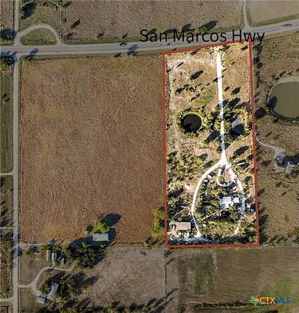 10.7 Acres of Improved Commercial Land for Sale in Martindale, Texas