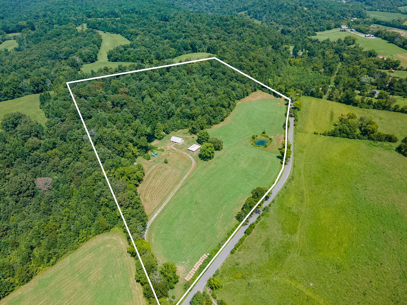 25 Acres of Land with Home for Sale in Centerville, Tennessee