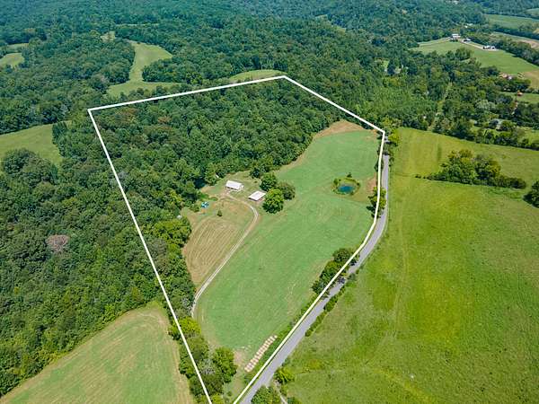 25 Acres of Land with Home for Sale in Centerville, Tennessee