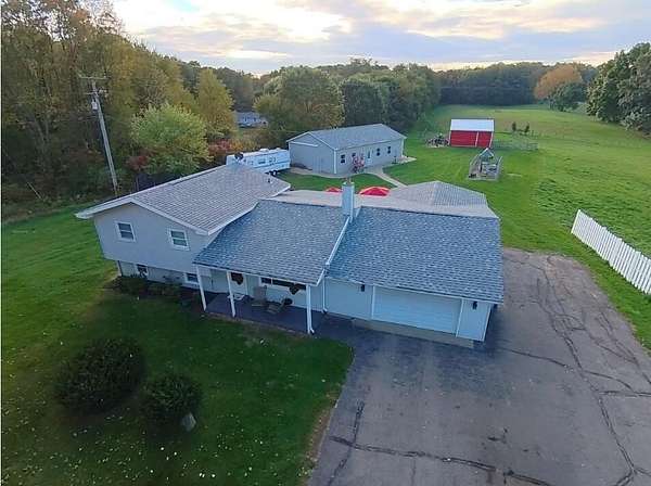 8.65 Acres of Land with Home for Sale in East Leroy, Michigan