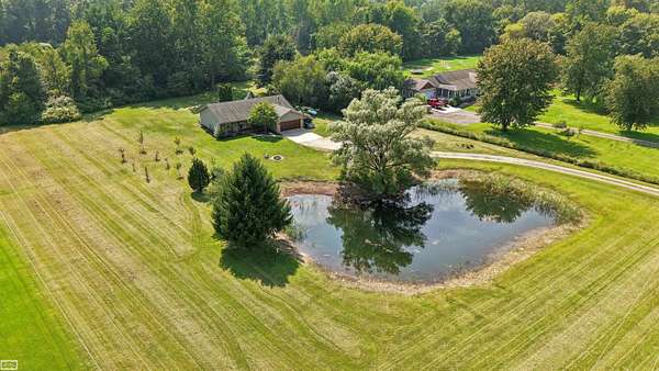 3 Acres of Land with Home for Sale in Cottrellville Township, Michigan