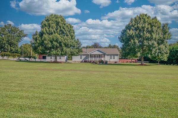 9.1 Acres of Land with Home for Sale in Dalton, Georgia