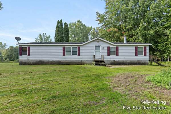 4.9 Acres of Land with Home for Sale in Fenwick, Michigan