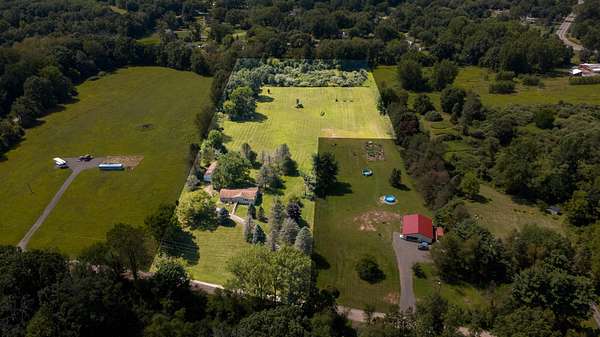 7.12 Acres of Land with Home for Sale in Pinckney, Michigan