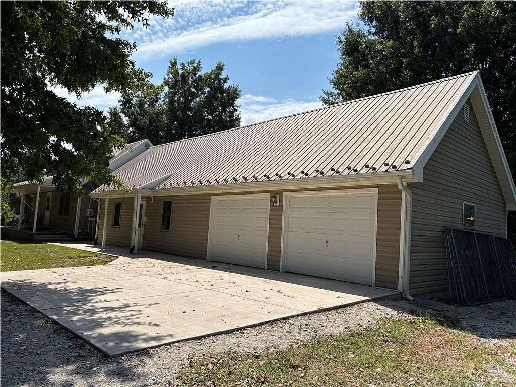 20 Acres of Land with Home for Sale in Pleasant Hill, Missouri