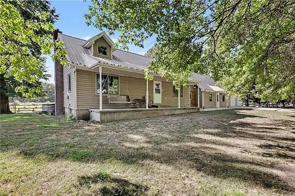 20 Acres of Land with Home for Sale in Pleasant Hill, Missouri