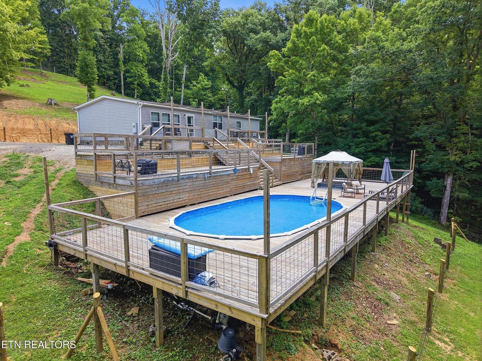 5 Acres of Land with Home for Sale in Friendsville, Tennessee