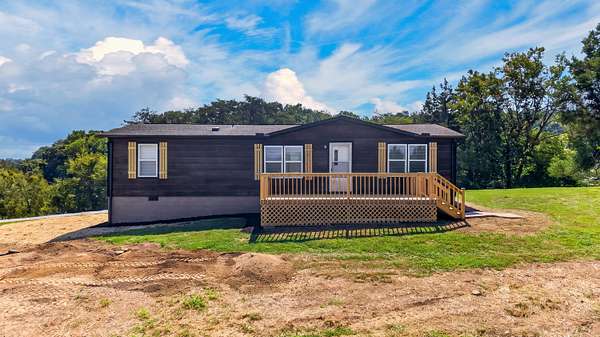 72.3 Acres of Land with Home for Sale in Rogersville, Tennessee