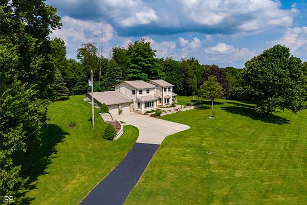 4.7 Acres of Land with Home for Sale in Trafalgar, Indiana