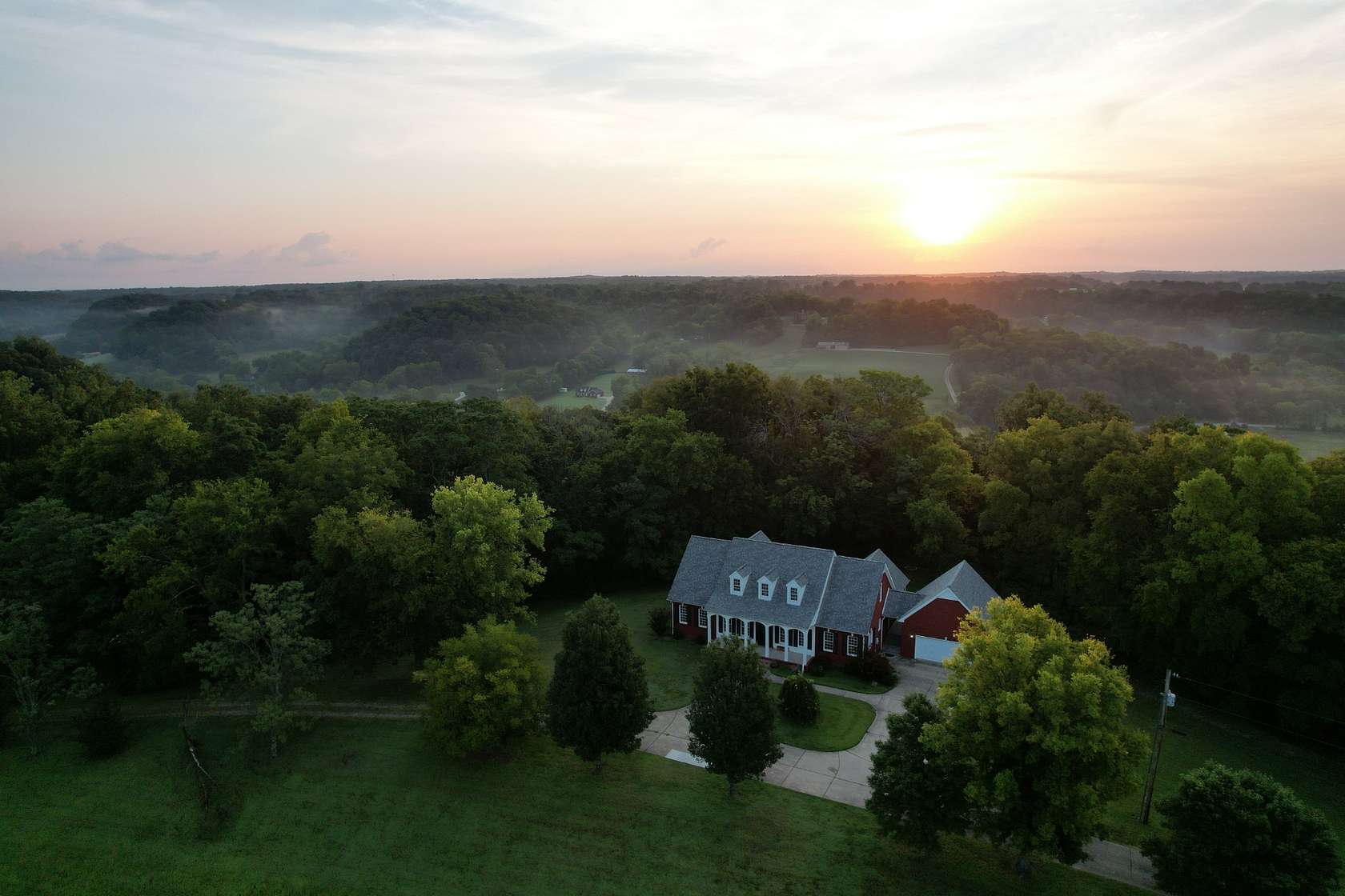 5 Acres of Land with Home for Sale in Santa Fe, Tennessee