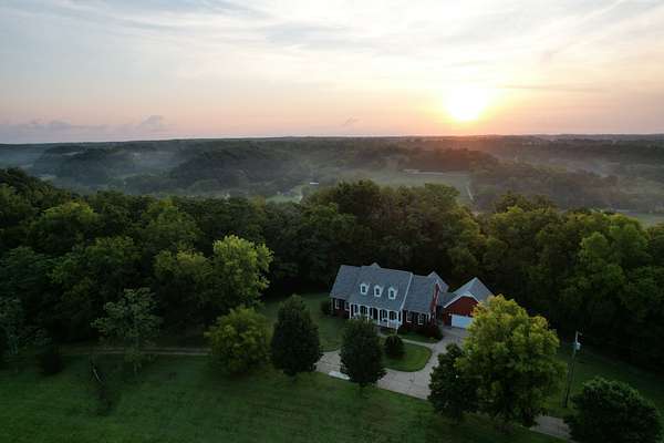 5 Acres of Land with Home for Sale in Santa Fe, Tennessee
