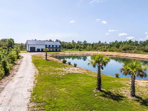 6.33 Acres of Land with Home for Sale in Holly Ridge, North Carolina