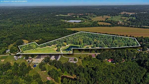 26 Acres of Land with Home for Sale in Nortonville, Kentucky