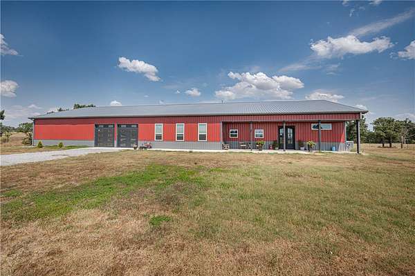 8 Acres of Land with Home for Sale in Gentry, Arkansas