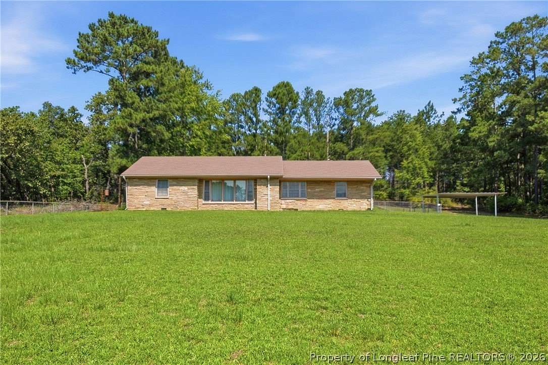 9 Acres of Land with Home for Sale in Bunnlevel, North Carolina