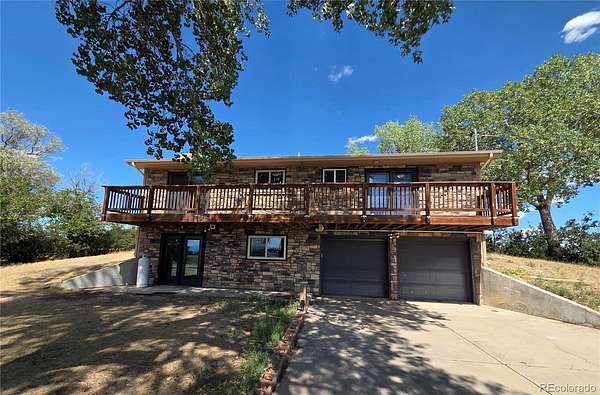 2 Acres of Land with Home for Sale in Aurora, Colorado