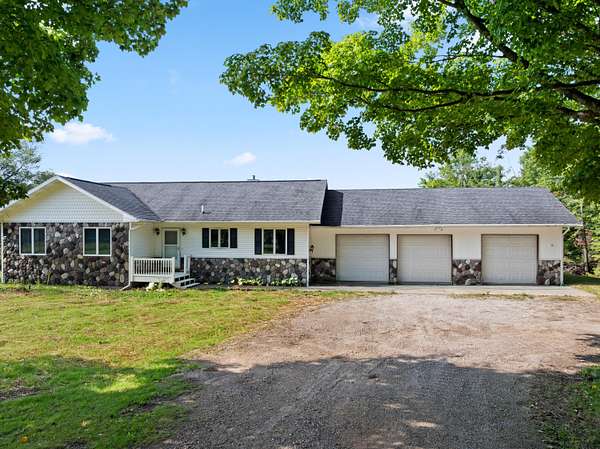 2.52 Acres of Land with Home for Sale in Elmira, Michigan