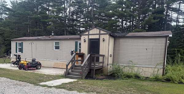1.85 Acres of Land with Home for Sale in Oxford, Maine