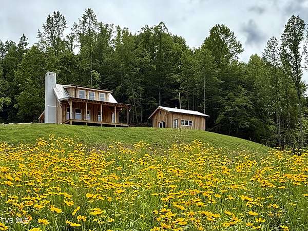 141 Acres of Land with Home for Sale in Del Rio, Tennessee