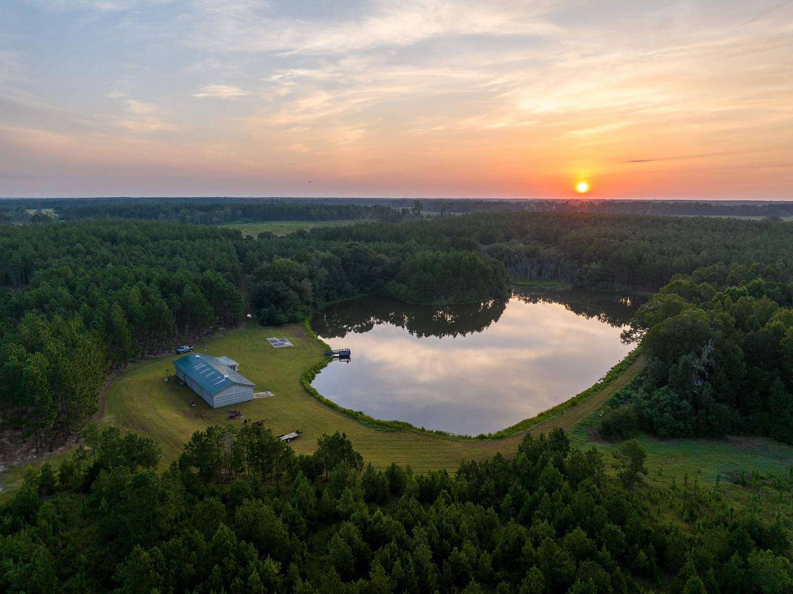 254 Acres of Land with Home for Sale in Holt, Georgia