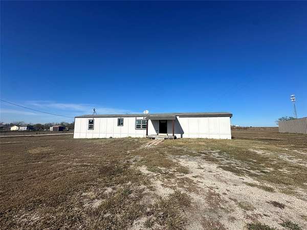 1.5 Acres of Land with Home for Sale in Ennis, Texas