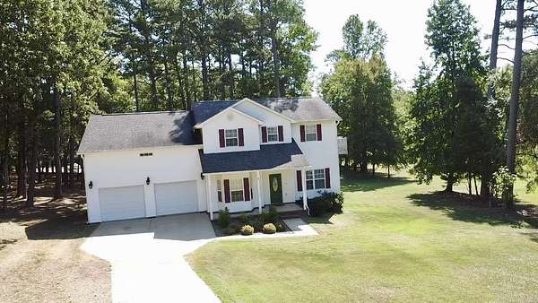 2.59 Acres of Land with Home for Sale in Clarksville, Arkansas