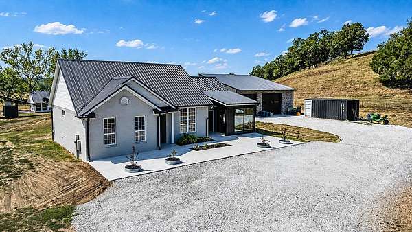 2.8 Acres of Land with Home for Sale in Gentry, Arkansas