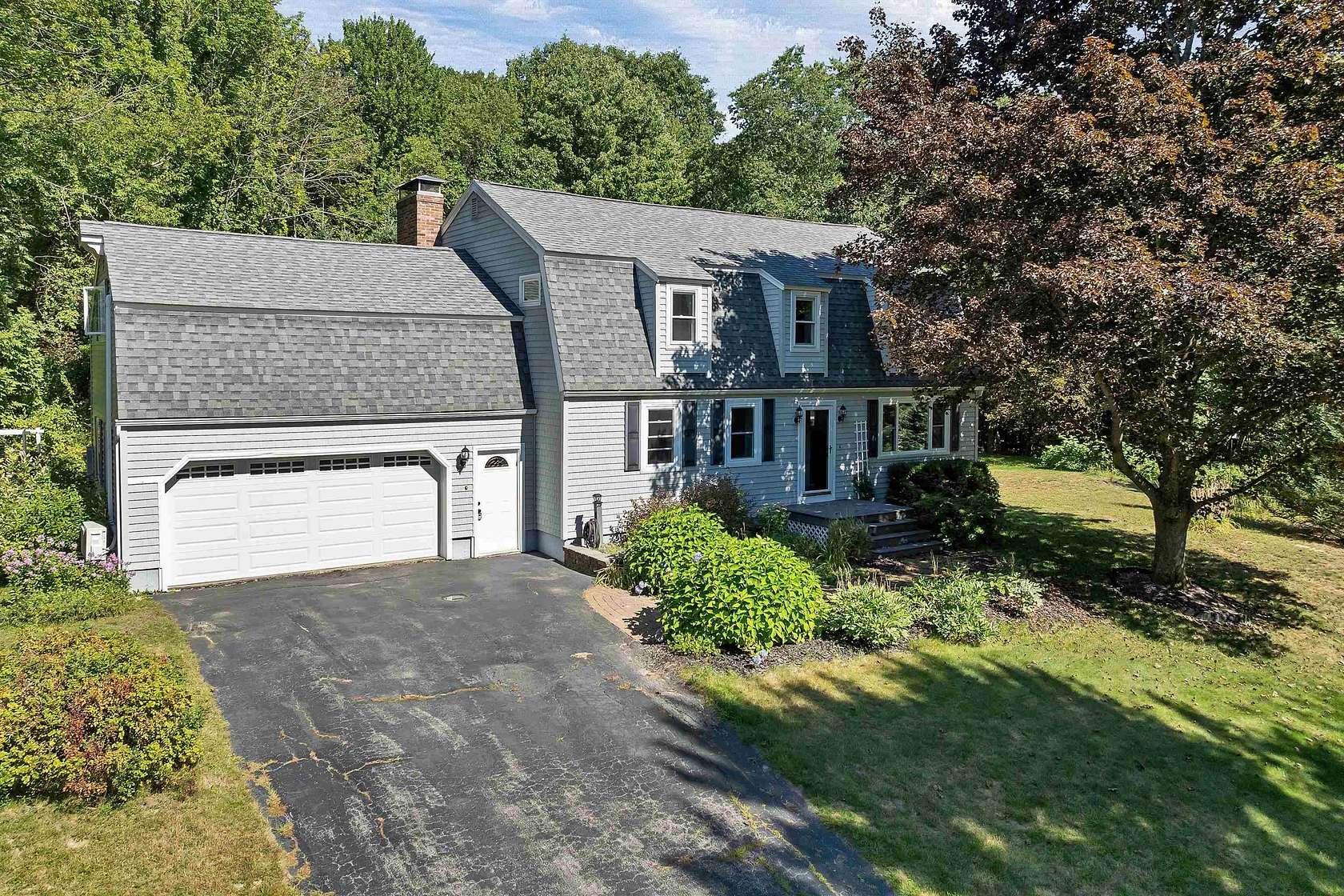 4 Acres of Land with Home for Sale in Gilford, New Hampshire