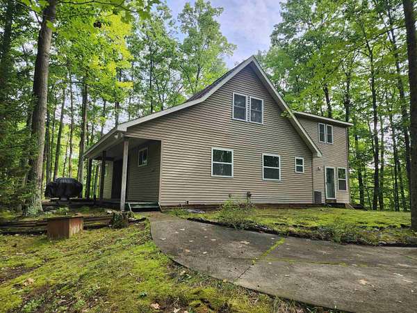 5.38 Acres of Land with Home for Sale in Harrison, Michigan