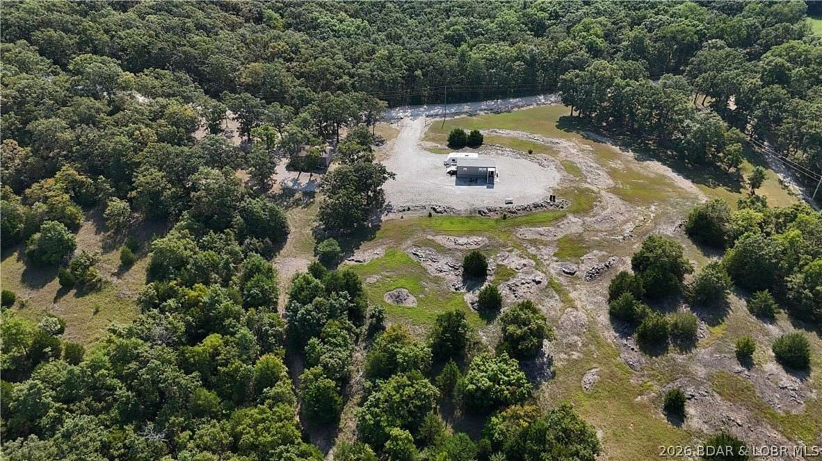 56 Acres of Recreational Land with Home for Sale in Lincoln, Missouri