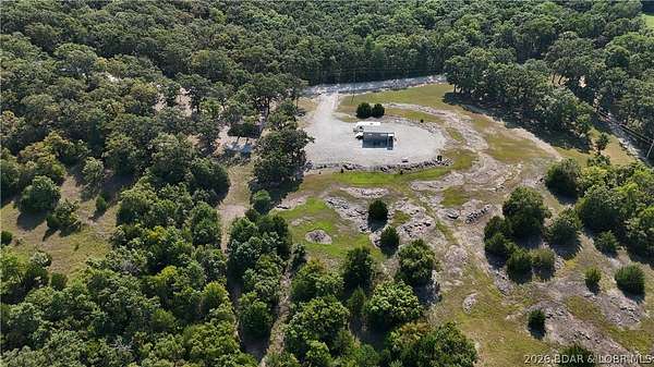56 Acres of Recreational Land with Home for Sale in Lincoln, Missouri