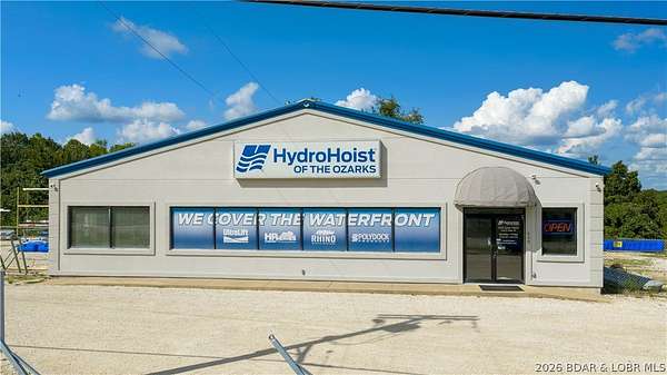 8.79 Acres of Improved Commercial Land for Sale in Laurie, Missouri