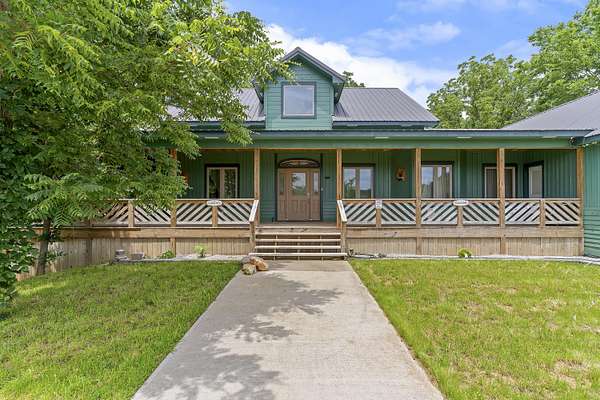7.64 Acres of Land with Home for Sale in Aldrich, Missouri