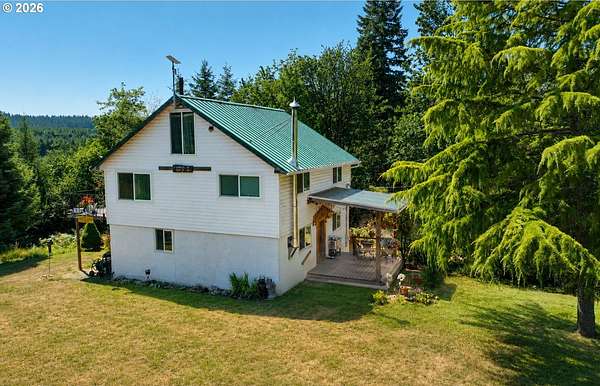 67.8 Acres of Land with Home for Sale in Clatskanie, Oregon