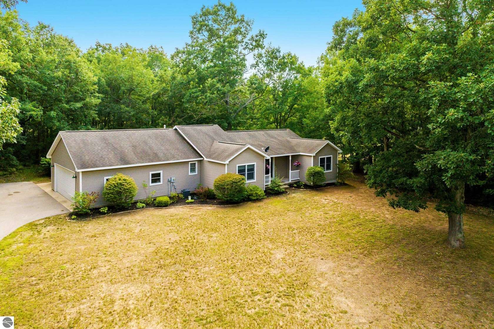 5 Acres of Land with Home for Sale in Interlochen, Michigan