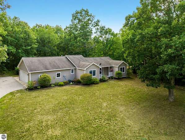 5 Acres of Land with Home for Sale in Interlochen, Michigan