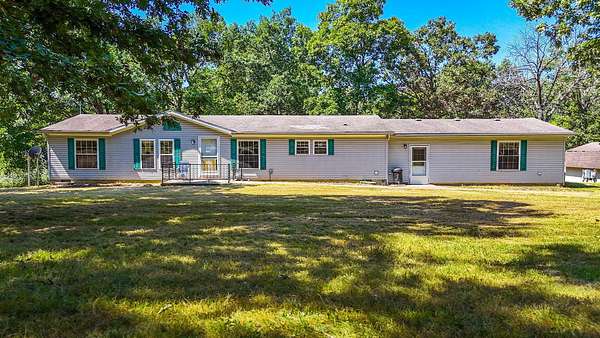 5.84 Acres of Land with Home for Sale in Thompson, Missouri