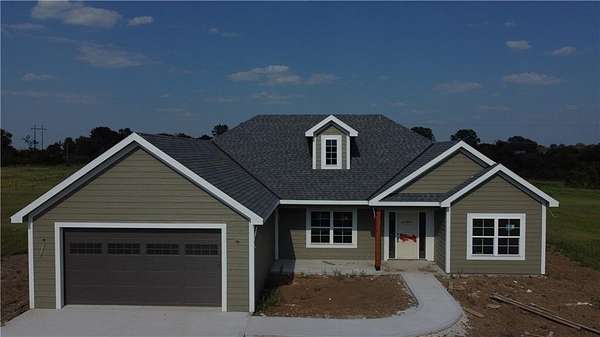 4.29 Acres of Land with Home for Sale in Holden, Missouri