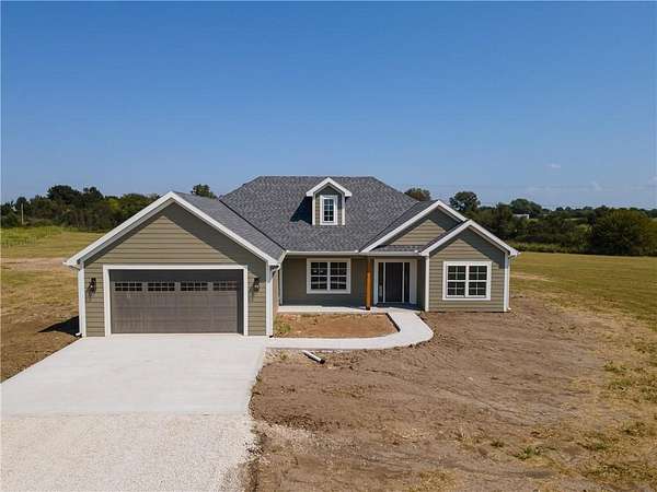 4.29 Acres of Land with Home for Sale in Holden, Missouri