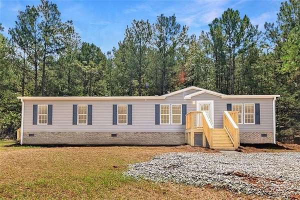 1.53 Acres of Land with Home for Sale in Maysville, Georgia