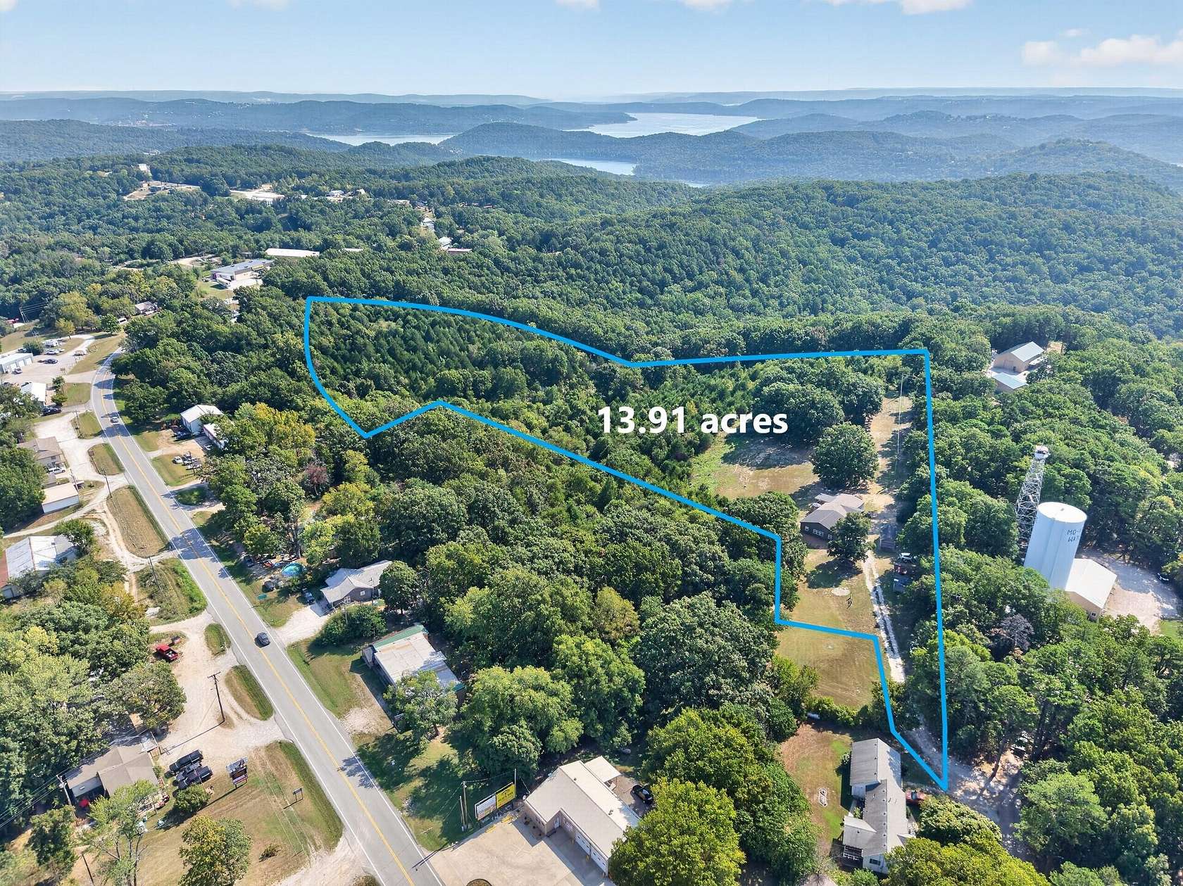 14 Acres of Land with Home for Sale in Lampe, Missouri