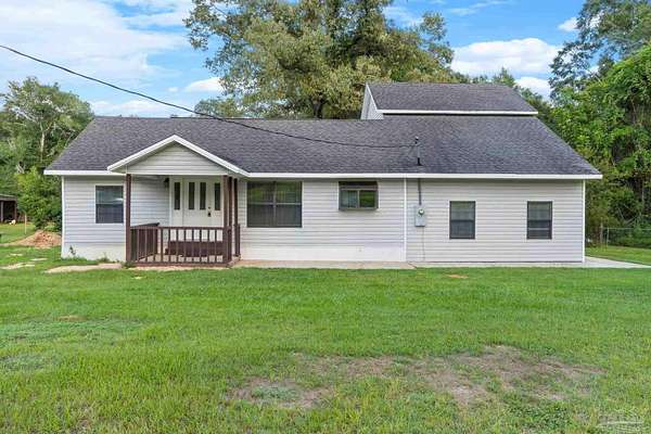 1.5 Acres of Land with Home for Sale in Baker, Florida
