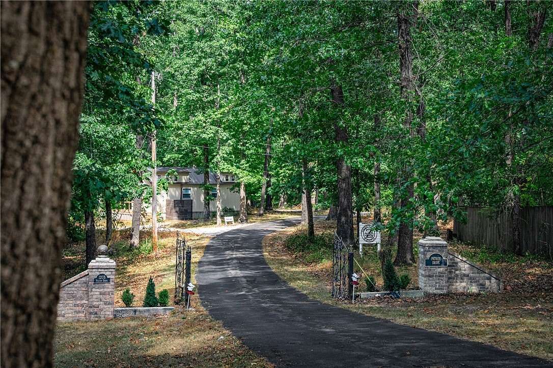 16.9 Acres of Land with Home for Sale in Rogers, Arkansas